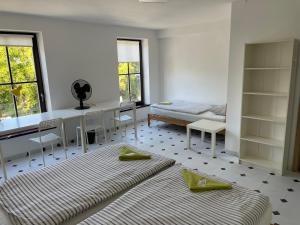 Postel nebo postele na pokoji v ubytování Residence Meljska