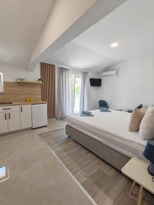 Kuchyň nebo kuchyňský kout v ubytování Apartments Kata