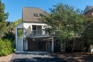 a house with a balcony and a driveway at 778 Spinnaker Beach House in Seabrook Island