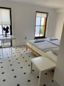 Postel nebo postele na pokoji v ubytování Residence Meljska