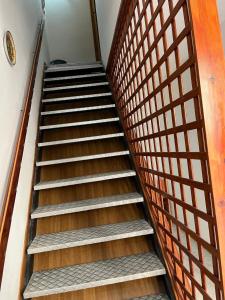 a set of stairs in a building at Il Corallo in Porto Empedocle