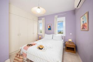 Ένα ή περισσότερα κρεβάτια σε δωμάτιο στο Villa Elessa +36 φωτογραφίες