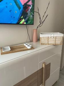 TV a/nebo společenská místnost v ubytování Appartamento casa Dalia + 19 fotografií