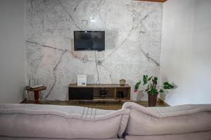 Et tv og/eller underholdning på Santo Antônio do Pinhal - Centro