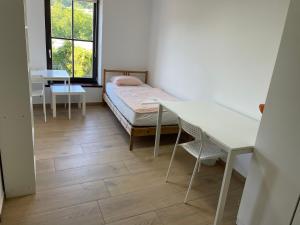 Postel nebo postele na pokoji v ubytování Residence Meljska