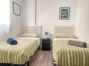 Postel nebo postele na pokoji v ubytování Apartamento con Solarium by DV Properties #P5H3