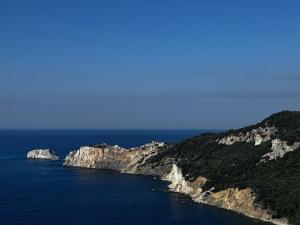 an island in the middle of the ocean at SkiathitissasMaison in Skiathos