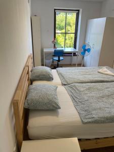 Postel nebo postele na pokoji v ubytování Residence Meljska