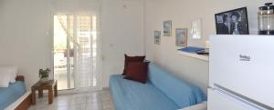 A kitchen or kitchenette at Agapi Apartments