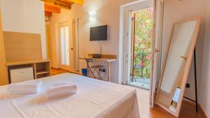 Postel nebo postele na pokoji v ubytování Antiche Mura - Italian Homing