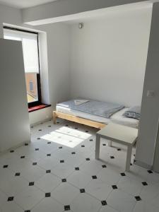 Postel nebo postele na pokoji v ubytování Residence Meljska