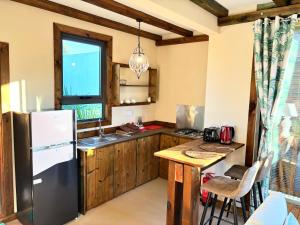 Una cocina o cocineta en Chamarel Mountain chalets
