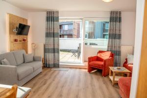 Et opholdsområde på Ferienwohnung Sonnendeck