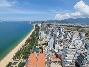 an aerial view of a city and a beach at Infinity Sea View Apartment in Nha Trang