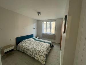 Ένα ή περισσότερα κρεβάτια σε δωμάτιο στο Villa Laudouze
