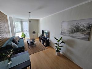 TV a/nebo společenská místnost v ubytování VB City Apartment