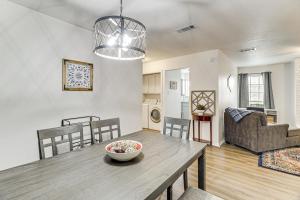 a dining room and living room with a table and chairs at Home 4 Mi to ATandT Stadium Bring Your Pets! in Arlington
