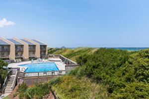 an aerial view of a resort with a swimming pool at Quite Right in Nags Head