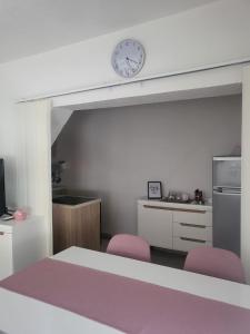 Η κουζίνα ή μικρή κουζίνα στο Apartman MM