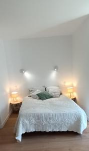 Postel nebo postele na pokoji v ubytování Gîte l'Echauguette du Perche