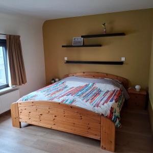 Postel nebo postele na pokoji v ubytování Zeeuitje + 7 fotografií