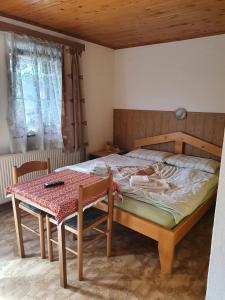 Postel nebo postele na pokoji v ubytování Apartmaji Julijana Podlipnik