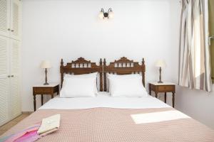Letto o letti in una camera di Aldea