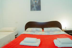 Posteľ alebo postele v izbe v ubytovaní Casa Sorriso