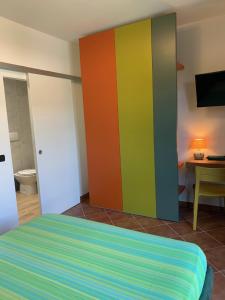 A bed or beds in a room at Casa Paola nel Chianti