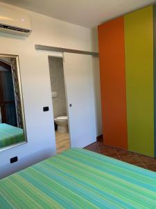 A bed or beds in a room at Casa Paola nel Chianti
