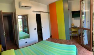 A bed or beds in a room at Casa Paola nel Chianti