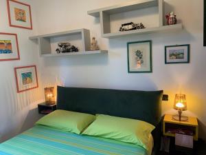 A bed or beds in a room at Casa Paola nel Chianti