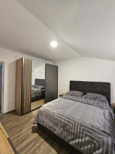 Postel nebo postele na pokoji v ubytování Apartman Ivan