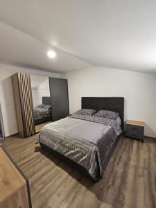 Postel nebo postele na pokoji v ubytování Apartman Ivan