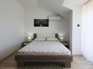 Posteľ alebo postele v izbe v ubytovaní Stoja Apartment