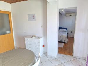 Posteľ alebo postele v izbe v ubytovaní Perica apartment and Perica room with separate entrance