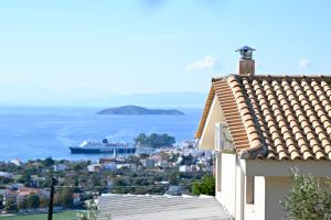 a view of the ocean from a house at Villa Theadora in Skiathos