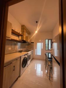 Kuchyň nebo kuchyňský kout v ubytování DIA Beach Room 2 + 6 fotografií