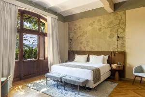 Postel nebo postele na pokoji v ubytování Borgo Dei Conti Resort Relais & Chateaux + 37 fotografií