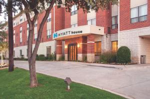 a building with a sign that reads knight house at Hyatt House Dallas Uptown in Dallas