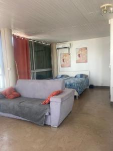 Setusvæði á PENTHOUSE SEASIDE 10 MIN port, croisière et aéroport