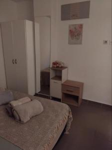Postel nebo postele na pokoji v ubytování Apartman "Vuković"