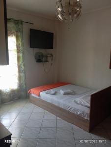 Postel nebo postele na pokoji v ubytování Aggela House + 24 fotografií