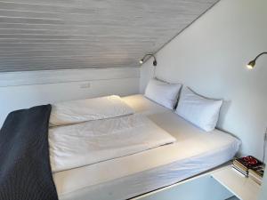 Postel nebo postele na pokoji v ubytování Haus Bergmandl FeWo Vier Jahreszeiten