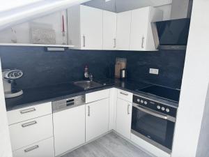 Kuchyň nebo kuchyňský kout v ubytování Haus Bergmandl FeWo Vier Jahreszeiten