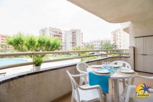 a balcony with a table and chairs and a view at Cordoba IBERPLAYA in Salou