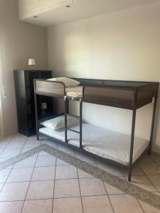 Ένα ή περισσότερα κρεβάτια σε δωμάτιο στο ALMIA casa vacanze +5 φωτογραφίες