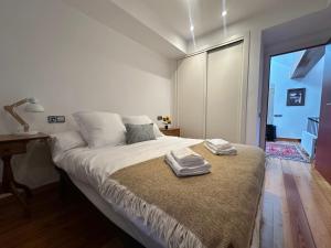 Cama o camas de una habitación en Casa do Bidueiro
