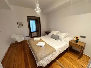 Cama o camas de una habitación en Casa do Bidueiro