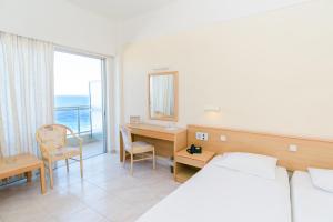 Cama ou camas em um quarto em Hotel Riviera